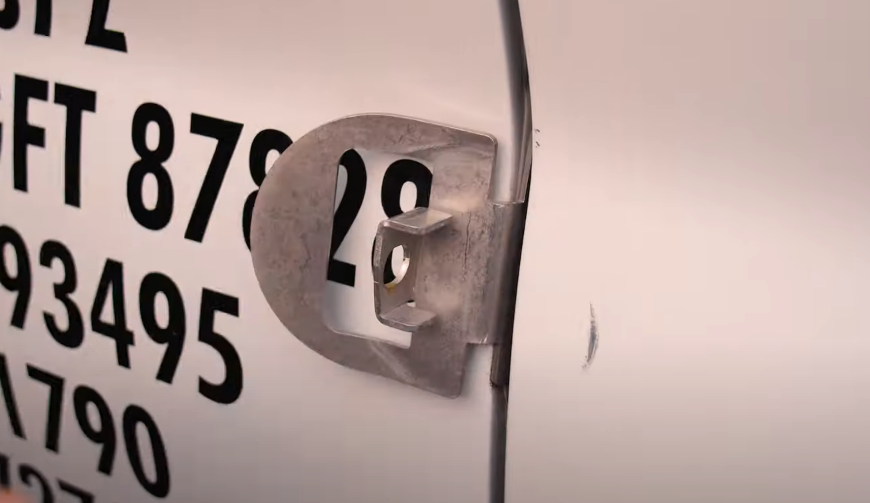 Puck lock brackets sliced clean through by a cordless grinder